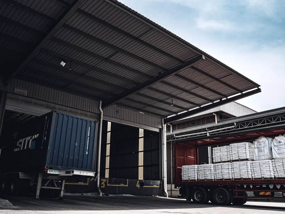 A truck being loaded at a warehouse dock