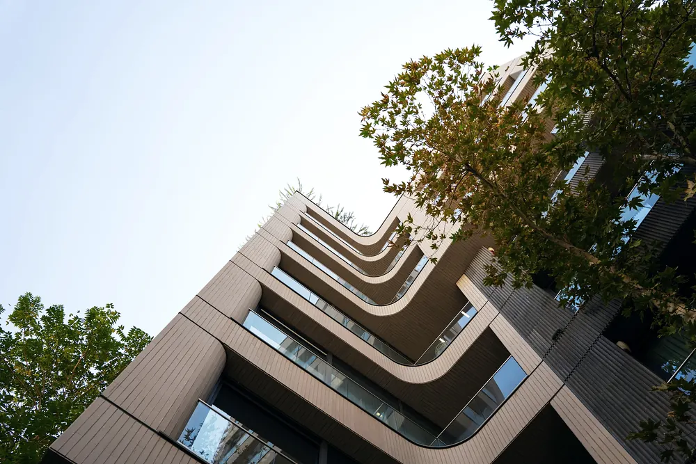 Modern residential building with curved balconies